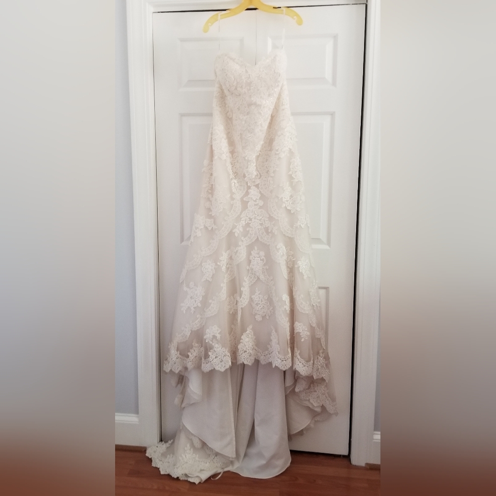 Romantic Strapless Lace fit and flare Wedding Gown in Ivory